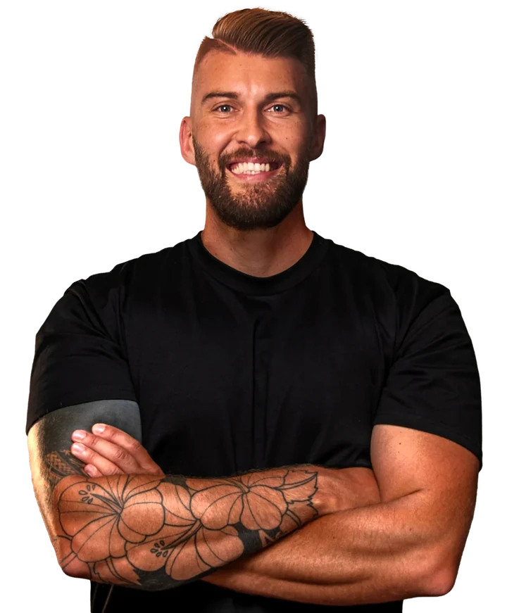 Asher Trotter, arms crossed, smiling